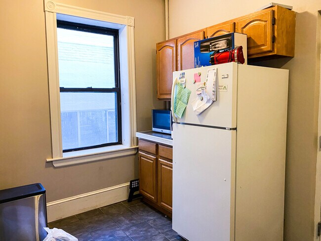 Updated Kitchen with breakfast nook to add a table! - 1066 Commonwealth Ave
