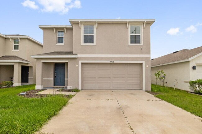 Foto del edificio - "Spacious 5-Bedroom Haven with Stunning Lake Views & Granite Elegance in Riverview!"