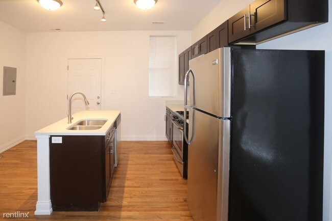 Foto del edificio - 4915 W Cuyler Ave