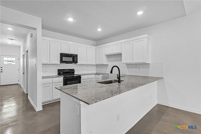 Foto del edificio - 905 Smoke Tree Ln