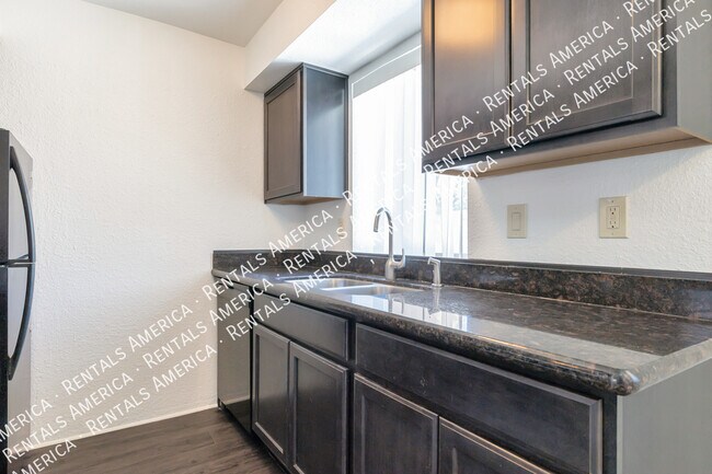 Foto del edificio - 4554 E Paradise Village Pkwy N