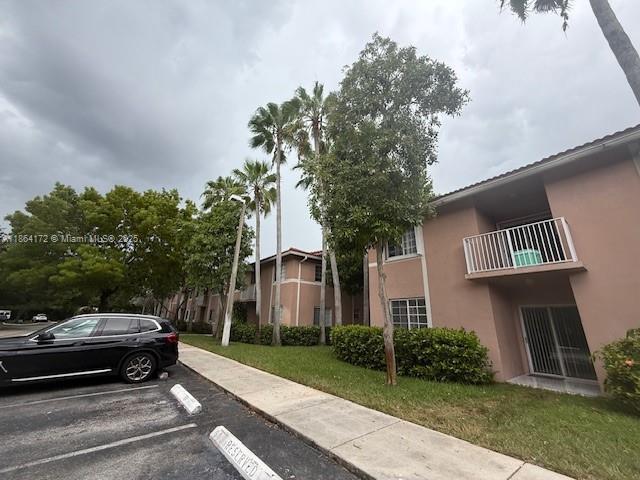 Building Photo - 3221 Sabal Palm Manor