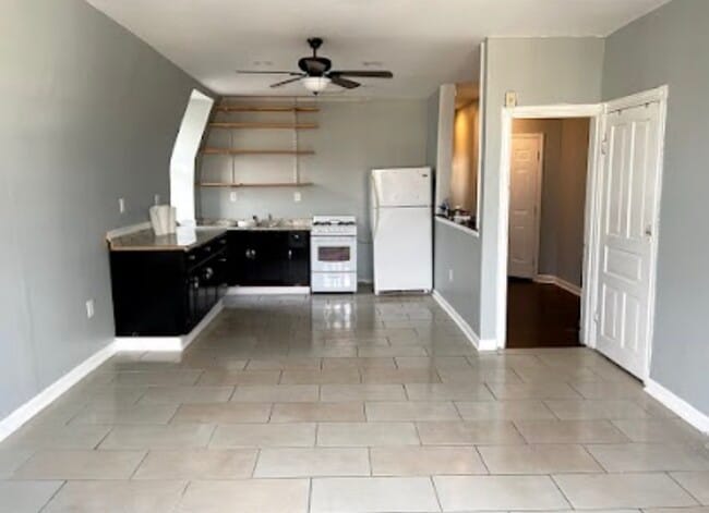 Kitchen and main living room - 4909 Cedar Ave