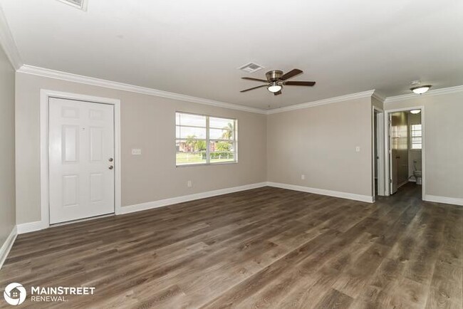 Building Photo - 1421 N E 7TH AVE, CAPE CORAL, FL 33909