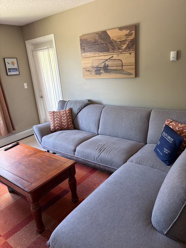 Photo - 403 Mackenzie Way SW (Airdrie, AB)