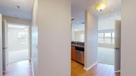 Located at 11901 Fourth St N in Saint Petersburg, FL, this single-floor, 2-bedroom, 2-bathroom residence offers a well-organized layout across a comfortably sized floor plan. The main living area is highlighted by soaring vaulted ceilings and plush carpeting, creating an open and airy atmosphere. A pass-through kitchen features warm wood cabinetry, dark granite countertops, and stainless steel appliances, including a dishwasher and microwave, with natural light flowing in through multiple windows. Hardwood-style flooring runs through the entry hallways and kitchen area, providing a clean contrast to the carpeted living and sleeping spaces. Both bedrooms are generously proportioned, each equipped with ceiling fans, soft carpeting, and windows that frame views of the surrounding Florida greenery. The primary bedroom includes its own dedicated closet with built-in wire shelving for organized storage. Each of the two bathrooms is outfitted with a full tub-shower combination and clean white tile surrounds, with granite countertops at the vanity. Additional closets throughout the unit provide ample storage. The layout flows efficiently through two hallways connecting all rooms, making the overall space both functional and comfortable.
