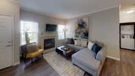 Located at 240 Natoma Station Dr in Folsom, CA, this single-story residence offers a well-designed layout with comfortable living spaces throughout. The living room serves as the heart of the home, featuring a tile-surround fireplace, crown molding, wood-look flooring, and natural light from a large window — an inviting space for both relaxing and entertaining. Adjacent to the living room, a defined dining area provides an intimate setting for meals, accented by a pendant light fixture and crown molding details.

The kitchen is thoughtfully appointed with white shaker cabinetry, granite-style countertops, stainless steel appliances including a refrigerator, range, and over-the-range microwave, and wood-look flooring that ties the space together cohesively.

The residence includes multiple bedrooms, each carpeted for warmth and comfort, with windows that bring in natural light. The bedrooms offer a calm, neutral palette well-suited for rest and relaxation. The bathroom features white cabinetry with granite-style countertops, a large mirror, a tub-shower combination, and wood-look flooring, delivering a clean and functional design. Overall, the space presents a consistent, modern aesthetic with practical finishes throughout.