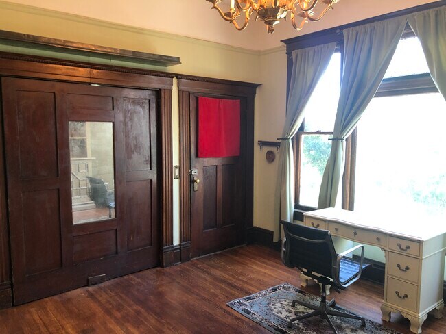 Walk-in closet and murphy bed. - 1339 W 24th St