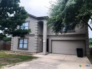 Building Photo - 7338 Raintree Forest