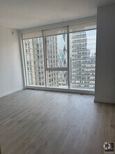 Building Photo - Luxury Studio Alcove w Rooftop Pool in Mid...