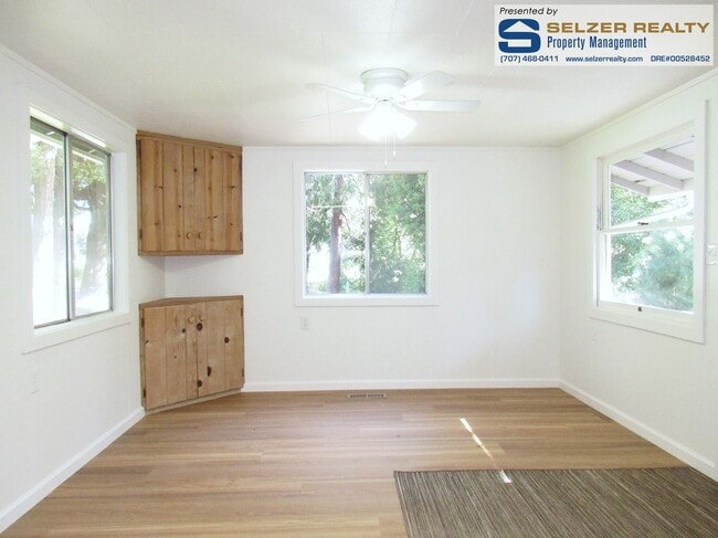 Building Photo - Roomy & renovated 2 bd. home in a country ...