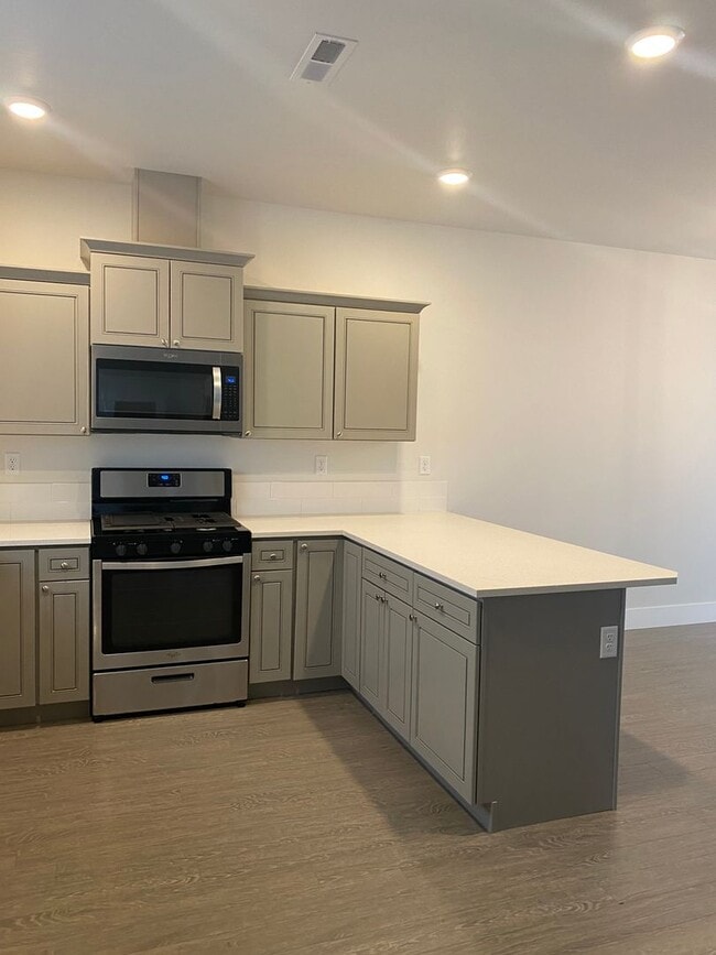 Building Photo - Discover this Gorgeous Townhome
