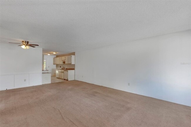 Building Photo - Comfortable & Spacious 3BR Condo with Built-In Closets and Backyard Patio in Tavares Community