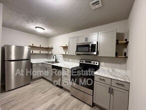 Building Photo - 1306 E McDaniel St