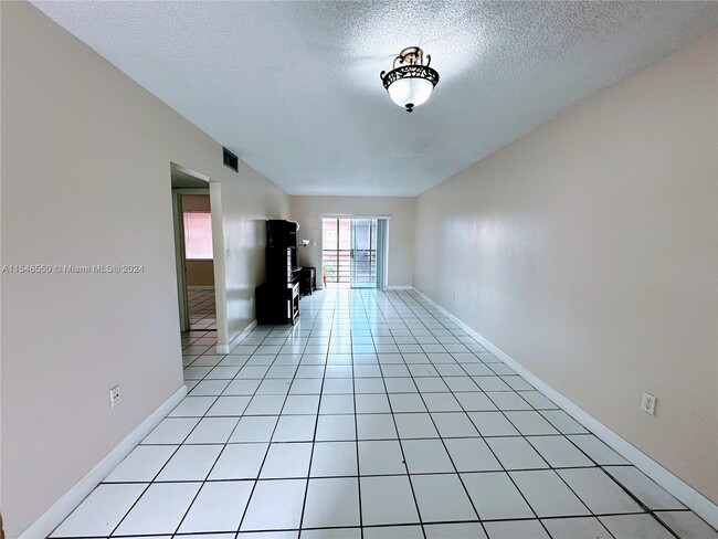 Building Photo - 6095 W 19th Ave
