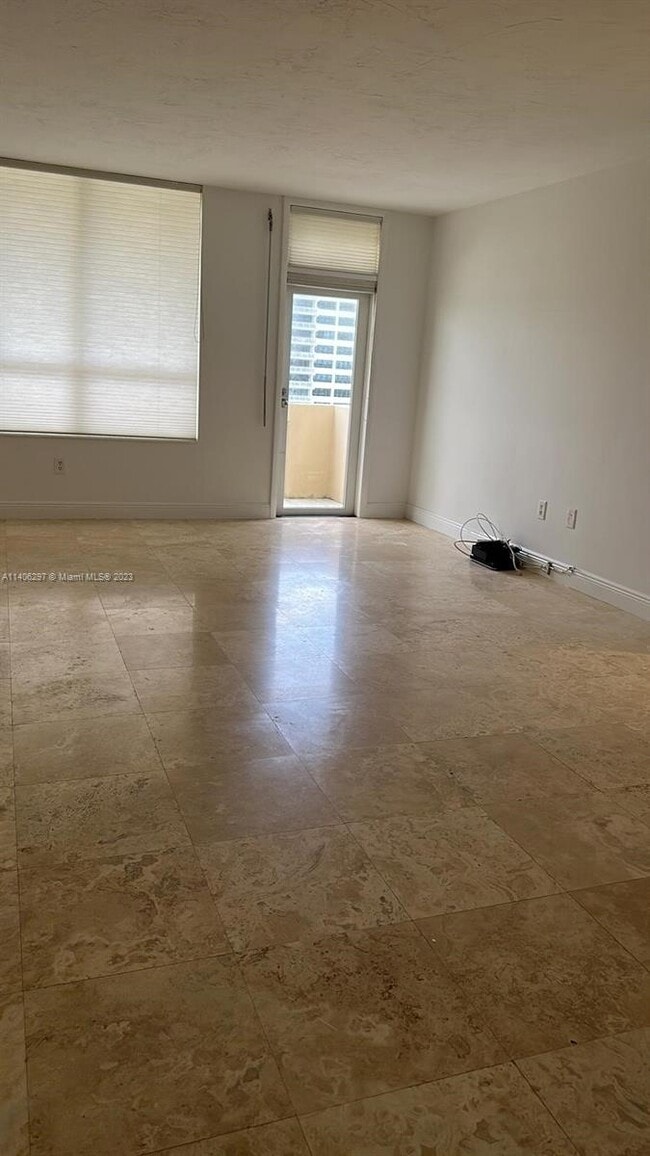 Building Photo - 10185 Collins Ave
