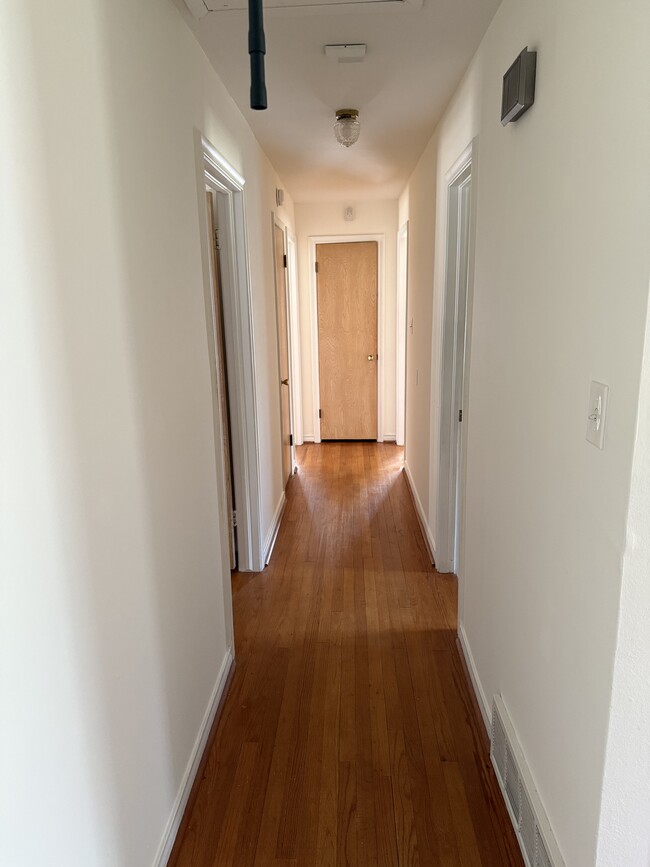 Hallway to bedrooms and bathrooms - 9012 Westbriar Dr