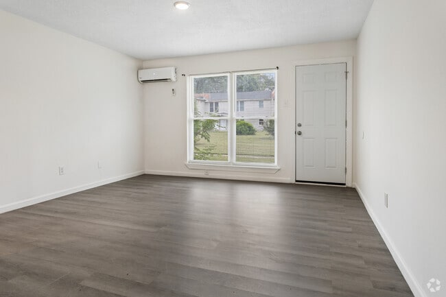 2BR, 1BA - 850SF - Living Room - The Courtyard Apartments