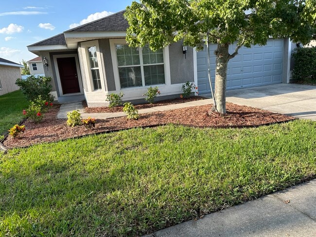 Beautiful entry with low maintenance landscaping - 10727 Standing Stone Dr