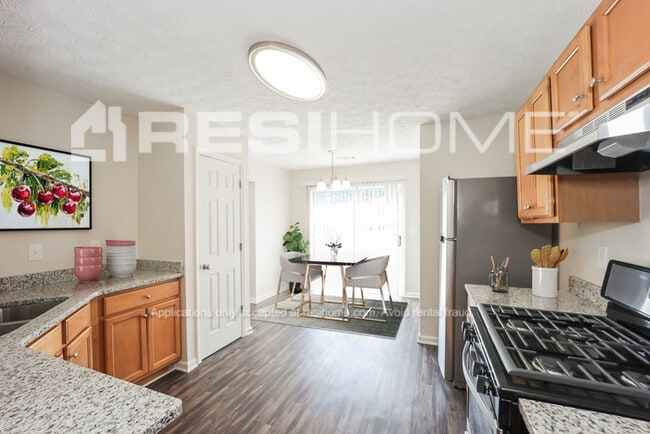 Building Photo - 7558 Woodbine Pl