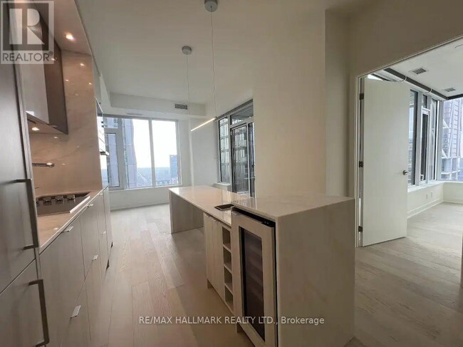 Photo du bâtiment - 11-4311 Yorkville Ave