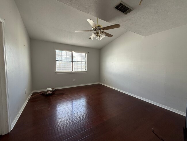 Primary bedroom with vaulted ceiling - 4136 Georgia Ave