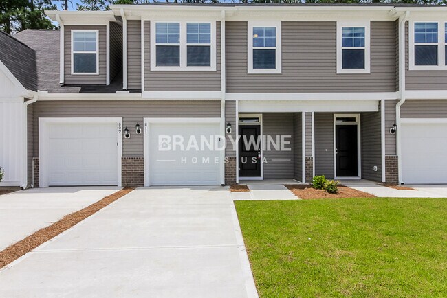 Building Photo - NEW LOWER RENTAL RATE LEASING SPECIAL: Rec...