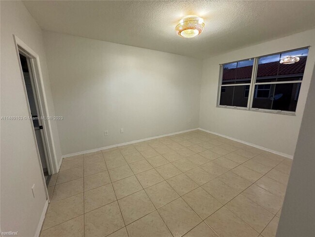 Building Photo - 3 br, 3 bath House - 8551 NW 138th St Apt ...