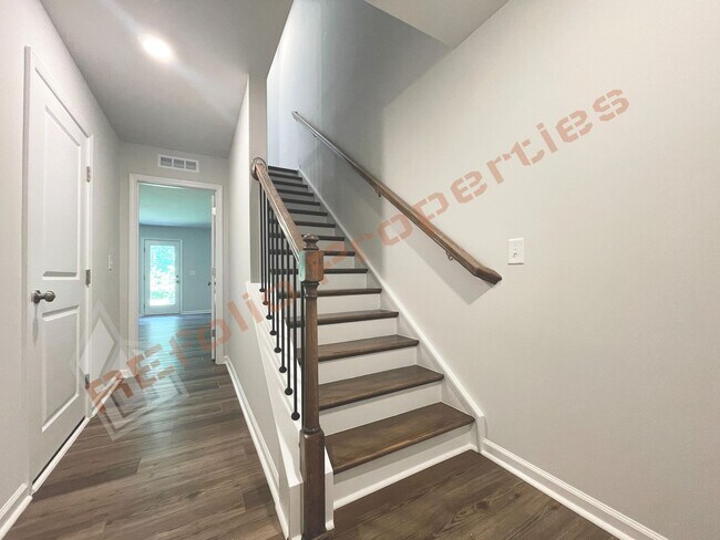 Building Photo - Brand-New 3BR/3.5BA Townhome w/ 1 Car Gara...