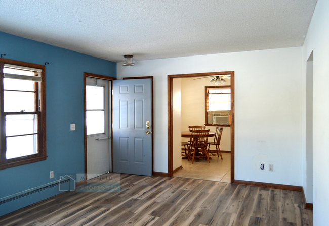 Living room looking into dining room - 409 Beech St