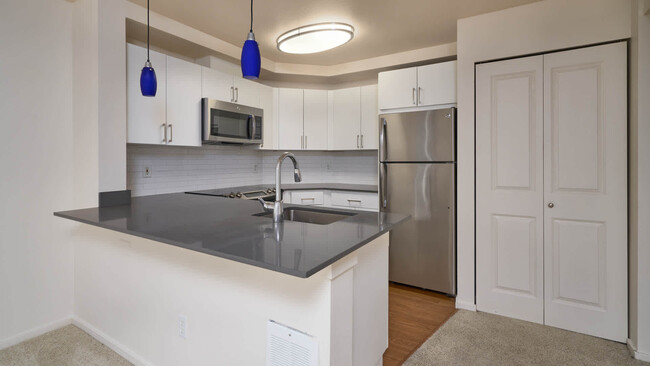 Kitchen with Stainless Steel Appliances - Metro on First