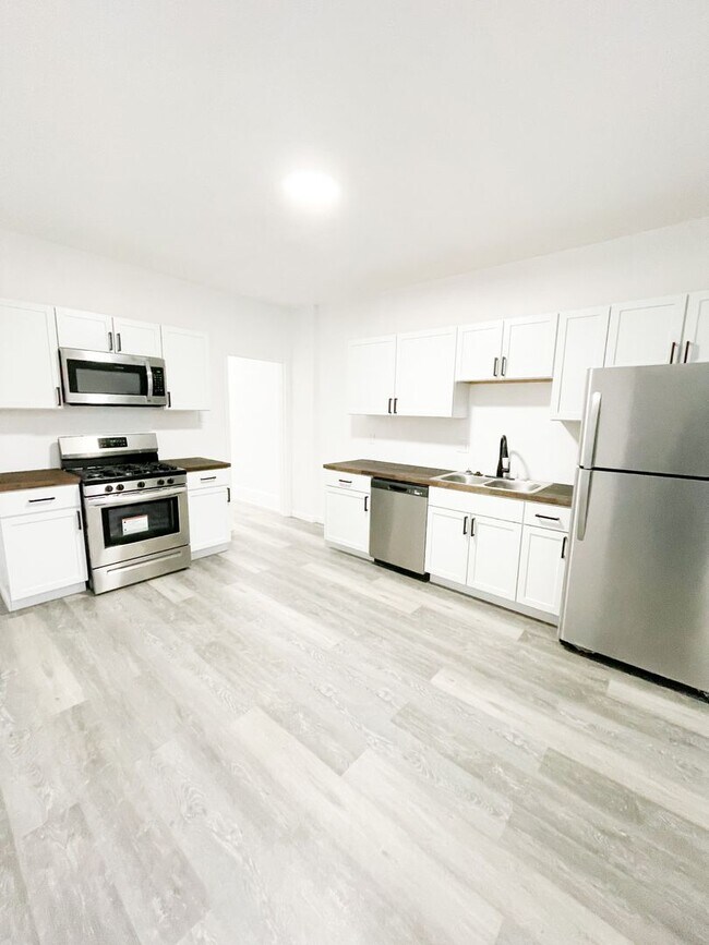 Building Photo - AVAILABLE May - Completely Renovated 2 Bed...