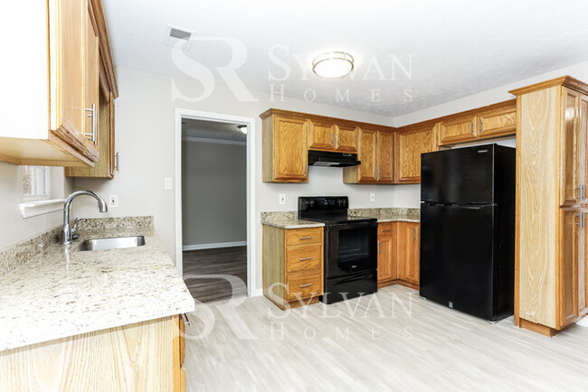 Building Photo - This 5 bedroom, 3.5 bathroom is sure to im...