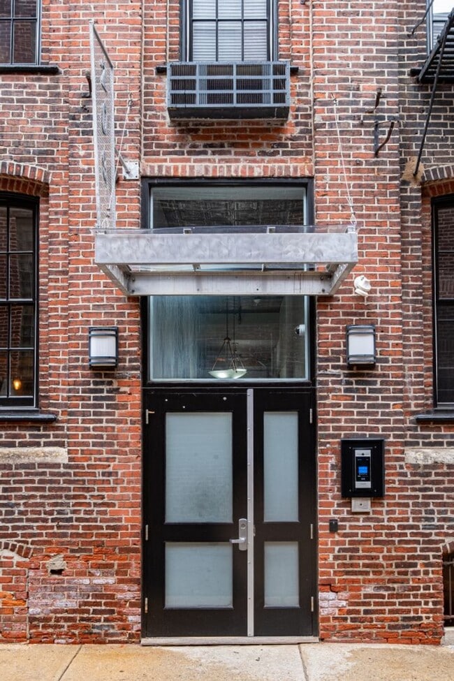 Foto del edificio - Luxurious 1-Bedroom Condo at Cuthbert Loft...