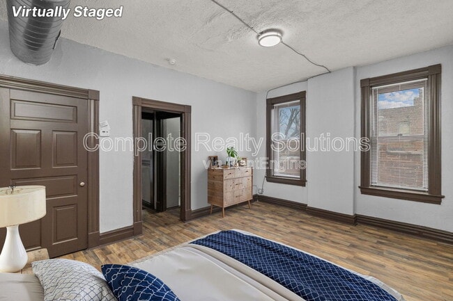 Building Photo - 3402 Dunnica Ave