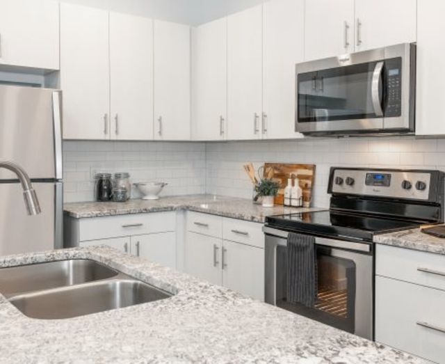 Encimeras de granito en la cocina - Parc View Apartments & Townhomes