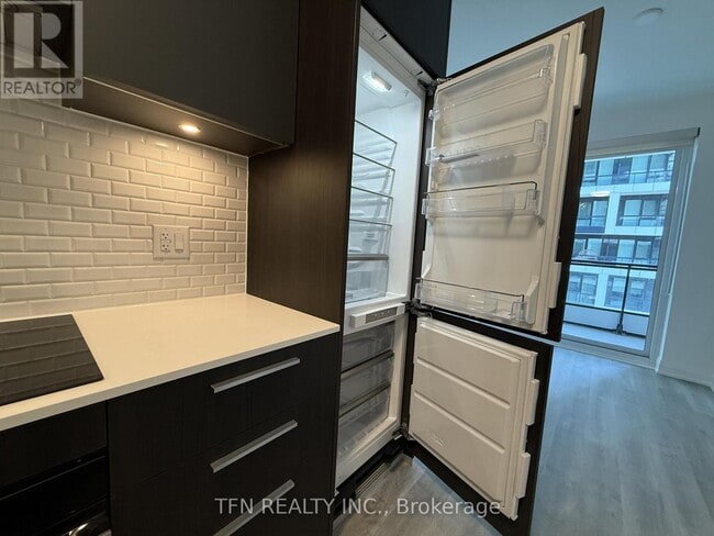 Photo du bâtiment - 65 Broadway Ave