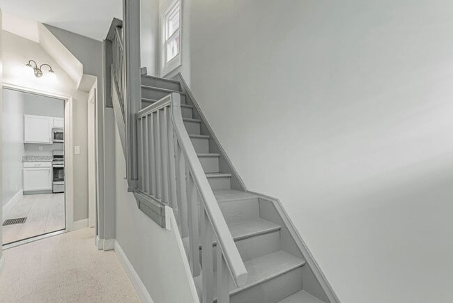 Stairs to the second floor unit - 5125 Carthage Ave