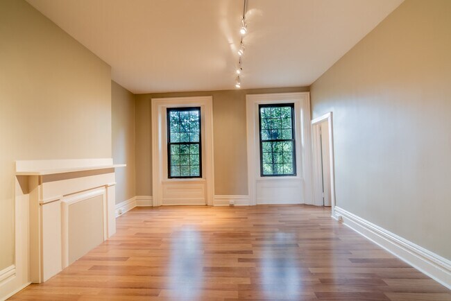 Bedroom with large windows, and lots of sunshine - 3611 Penn Ave