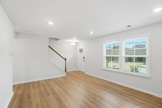 Foto del edificio - Brand-new three-story townhome in the University area at Senata at Research Park!