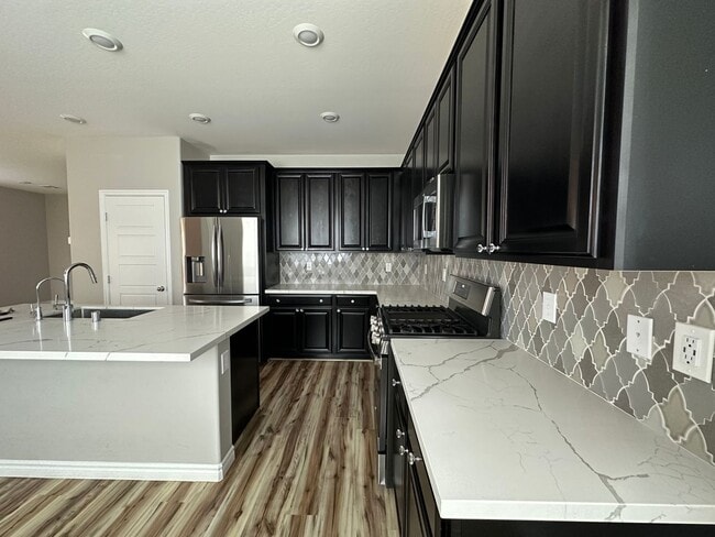 Building Photo - 4 bedroom Tule Springs Coming Soon