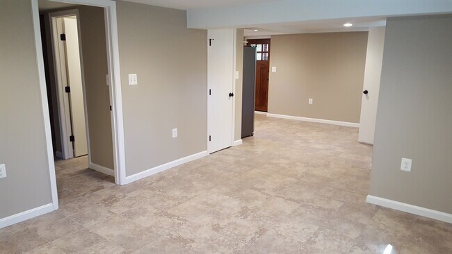 living room into dining/kitchenette - 6905 Rhode Island Ave