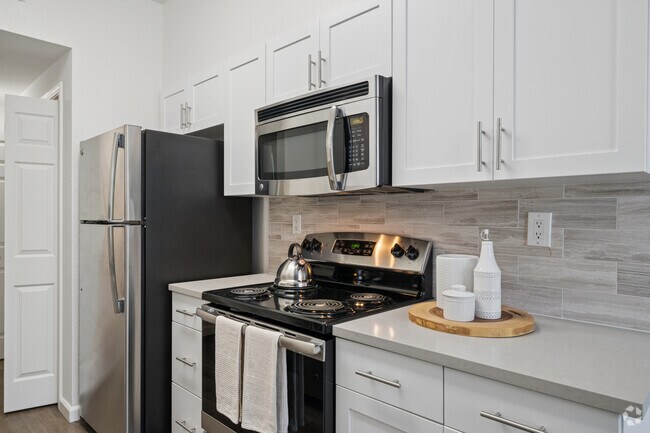 B - 2 habitaciones, 1 baño - 873 pies cuadrados - Cocina - Park Wood Apartments