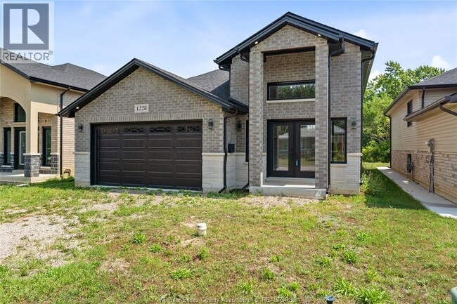 Photo du bâtiment - 1228 Tourangeau Rd