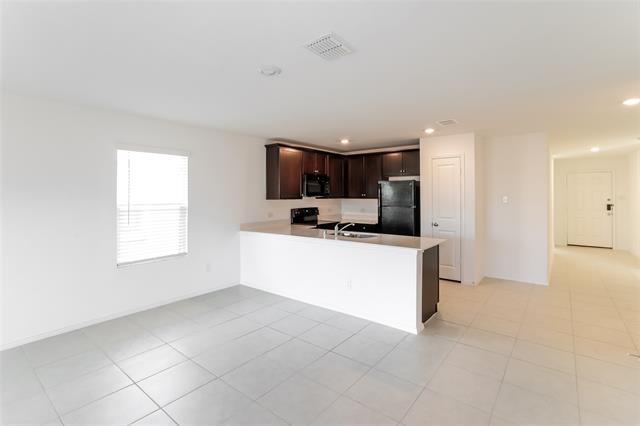 Foto del edificio - 5720 Rockrose Ln