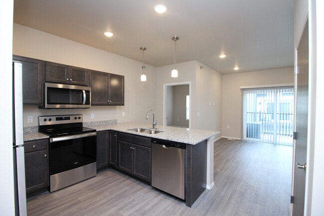 Building Photo - The Brett - Lavish Living