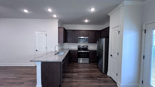 Photo - Modern 3-Bedroom Townhome in Gated Community – Prime Location!