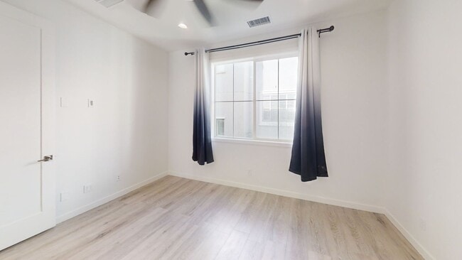 Building Photo - Modern Tri-Level Townhome Near Disneyland with Rooftop Patio