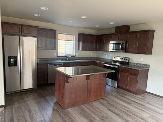 Building Photo - 3 Bedroom. 2.5 Bath House. Fenced Yard w/ ...