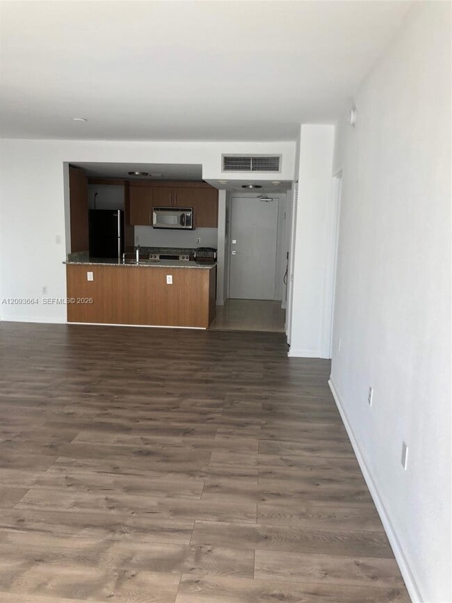 Building Photo - 10275 Collins Ave